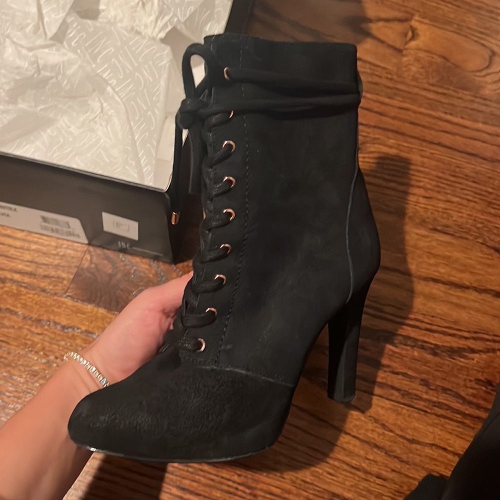 INC Worn once 6.5. Lace up suede boot.